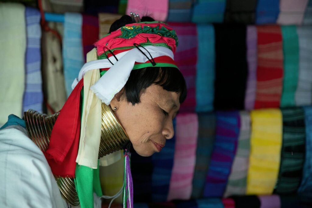 A Woman Wearing Neck Rings