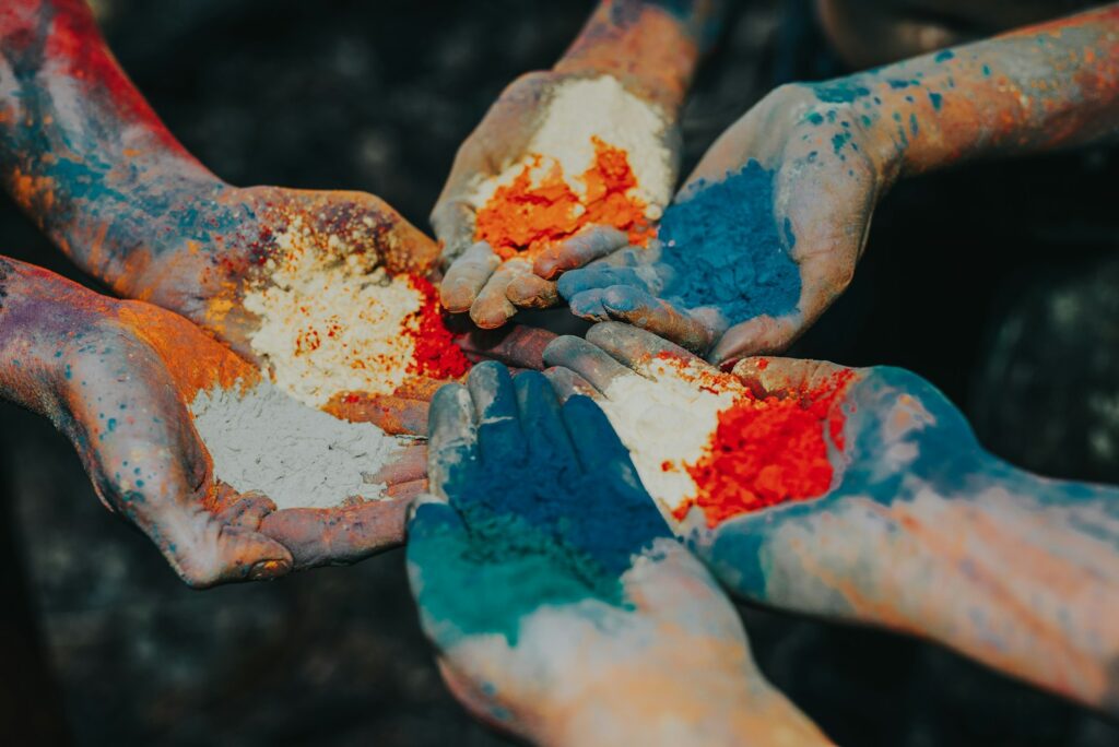 color powder on palms